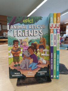 Book Cover for the 1st Animal Rescue Friends Book and the spines of book 2,3, and 4 in the series