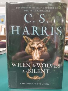 Cover for the mystery novel 'When the Wolves Are Silent'