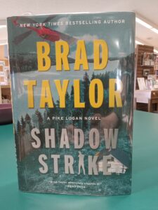 Cover for the novel 'Shadow Strike'