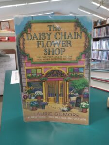 Cover for the novel 'The Daisy Chain Flower Shop'