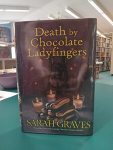 Cover for the mystery novel 'Death by Chocolate Ladyfingers'