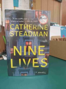 Cover for the Novel 'Nine Lives', with photos over apartment windows and the silhouettes of people inside them