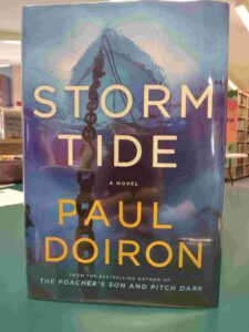 Cover for the novel 'Storm Tide', showing a picture of the underside of a boat